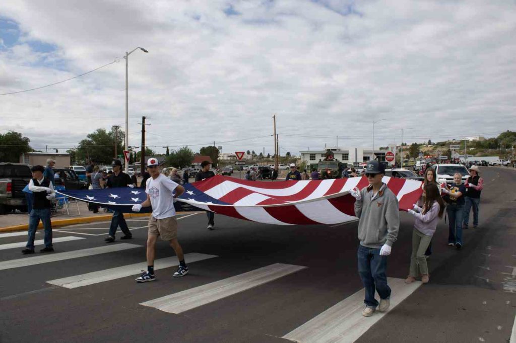 fiesta parade huge american flag