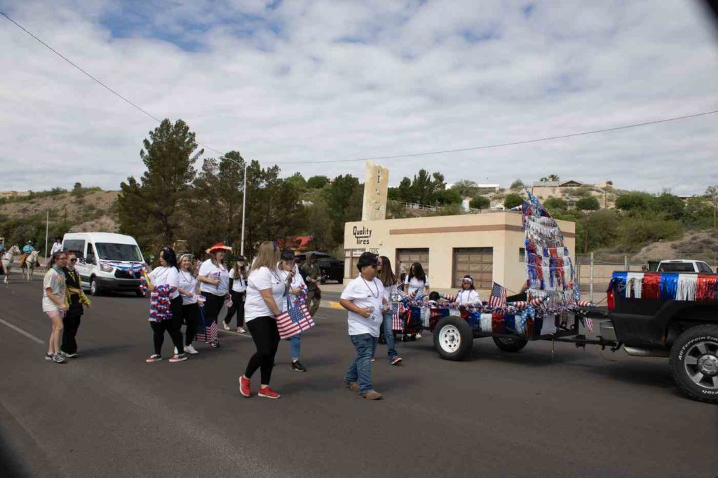 fiesta parade in front of quality tires