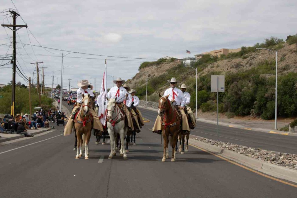 fiesta parade saddle club coming down broadway